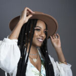 woman in a brown hat